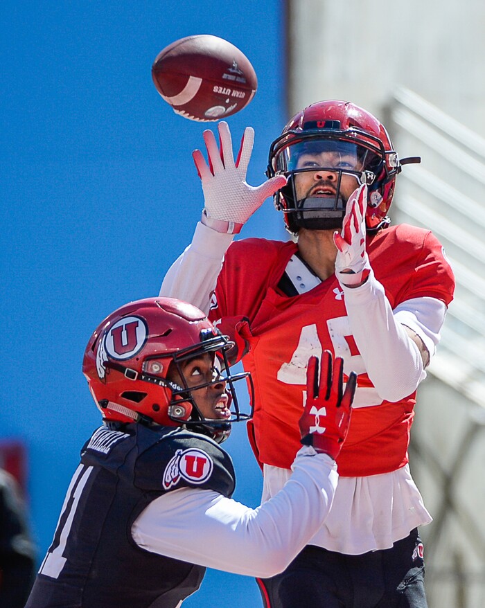 (Francisco Kjolseth  |  The Salt Lake Tribune)  Samson Nacua, #45, pulls in a pass over Malone Mataele, #11, as the Utah Utes hold their Spring scrimmage at Rice Eccles stadium on Saturday, March 30, 2019.