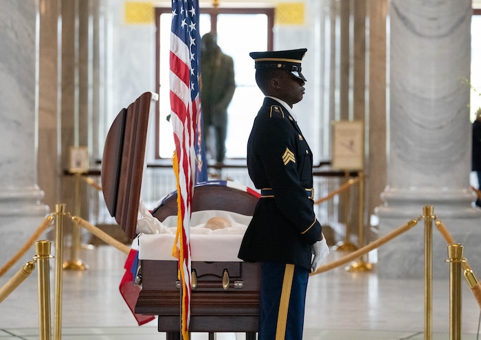 (Francisco Kjolseth | The Salt Lake Tribune) Army Sgt. Maurice Manns II stands at attention alongside the casket of former U.S. Sen. Orrin Hatch at the Utah Capitol on Wednesday, May 4, 2022.