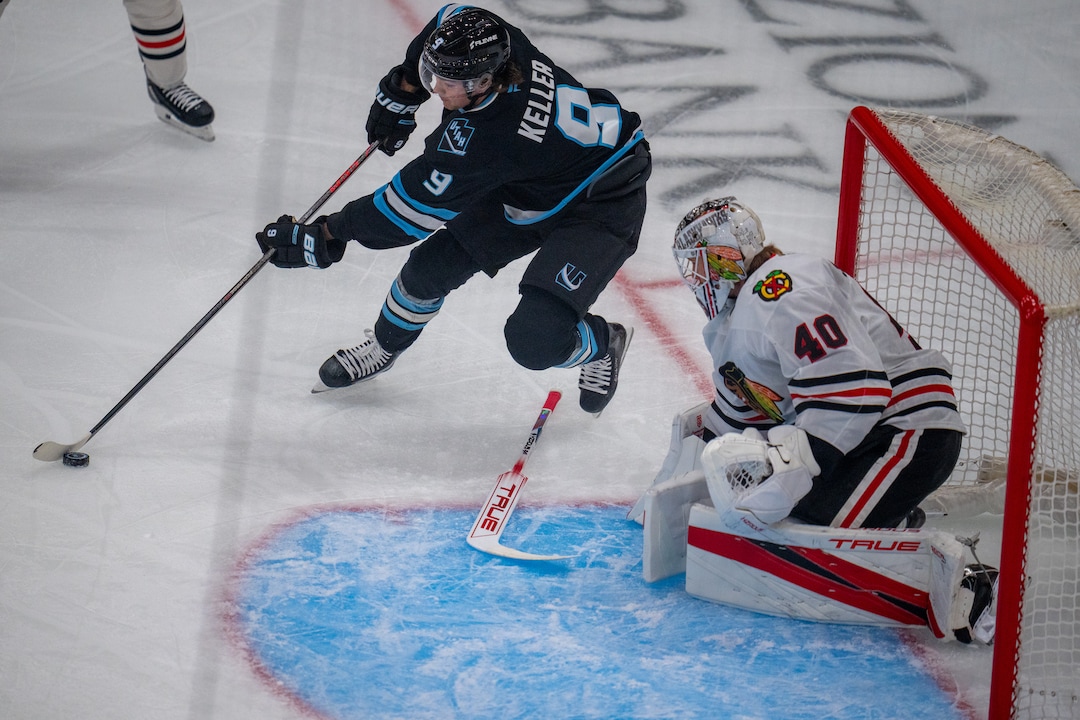 (Trent Nelson  |  The Salt Lake Tribune) Utah Mammoth right wing Clayton Keller (9) and Chicago Blackhawks goaltender Arvid Soderblom (40) as the Utah Mammoth host the Chicago Blackhawks, NHL hockey in Salt Lake City on Thursday, Oct. 1, 2026.