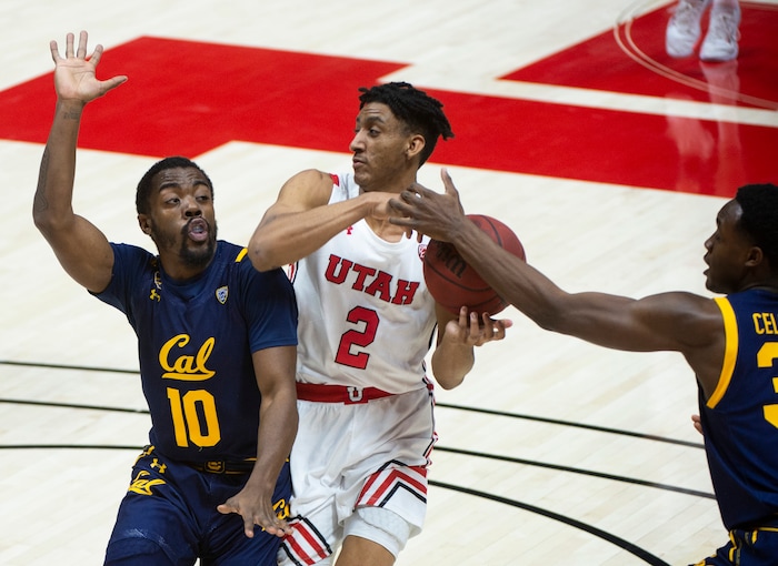 (Rick Egan | The Salt Lake Tribune)  Utah Utes guard Ian Martinez (2) has the ball snatched by California Golden Bears California Golden Bears guard Jalen Celestine (32) and California Golden Bears guard Makale Foreman (10), in PAC12 Basketball action between the Utah Utes and the California Golden Bears, on Wednesday, Jan. 16, 2021.