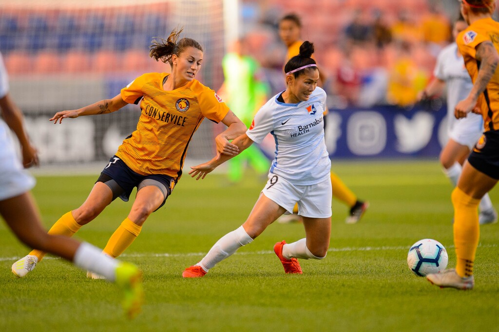 (Trent Nelson | The Salt Lake Tribune)
Utah Royals FC midfielder Mandy Laddish (7) and Sky Blue FC forward Nahomi Kawasumi (9) as Utah Royals FC hosts Sky Blue FC at Rio Tinto Stadium in Sandy on Saturday June 15, 2019.