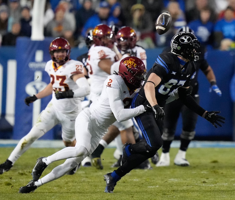 (Francisco Kjolseth | The Salt Lake Tribune) Brigham Young Cougars tight end Ethan Erickson (87) has his intended pass broken up by Iowa State Cyclones defensive back T.J. Tampa (2) during an NCAA college football game on Saturday, Nov. 11, 2023, in Provo, Utah.
