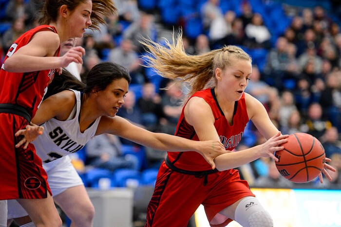 (Trent Nelson | The Salt Lake Tribune)  Skyline's Kiana Eskelson (3) reaches toward Springville's Brooke lynn Galbraith (4) as Skyline faces Springville in the 5A High School Girls' Basketball Tournament at SLCC in Taylorsville, Wednesday Feb. 21, 2018.