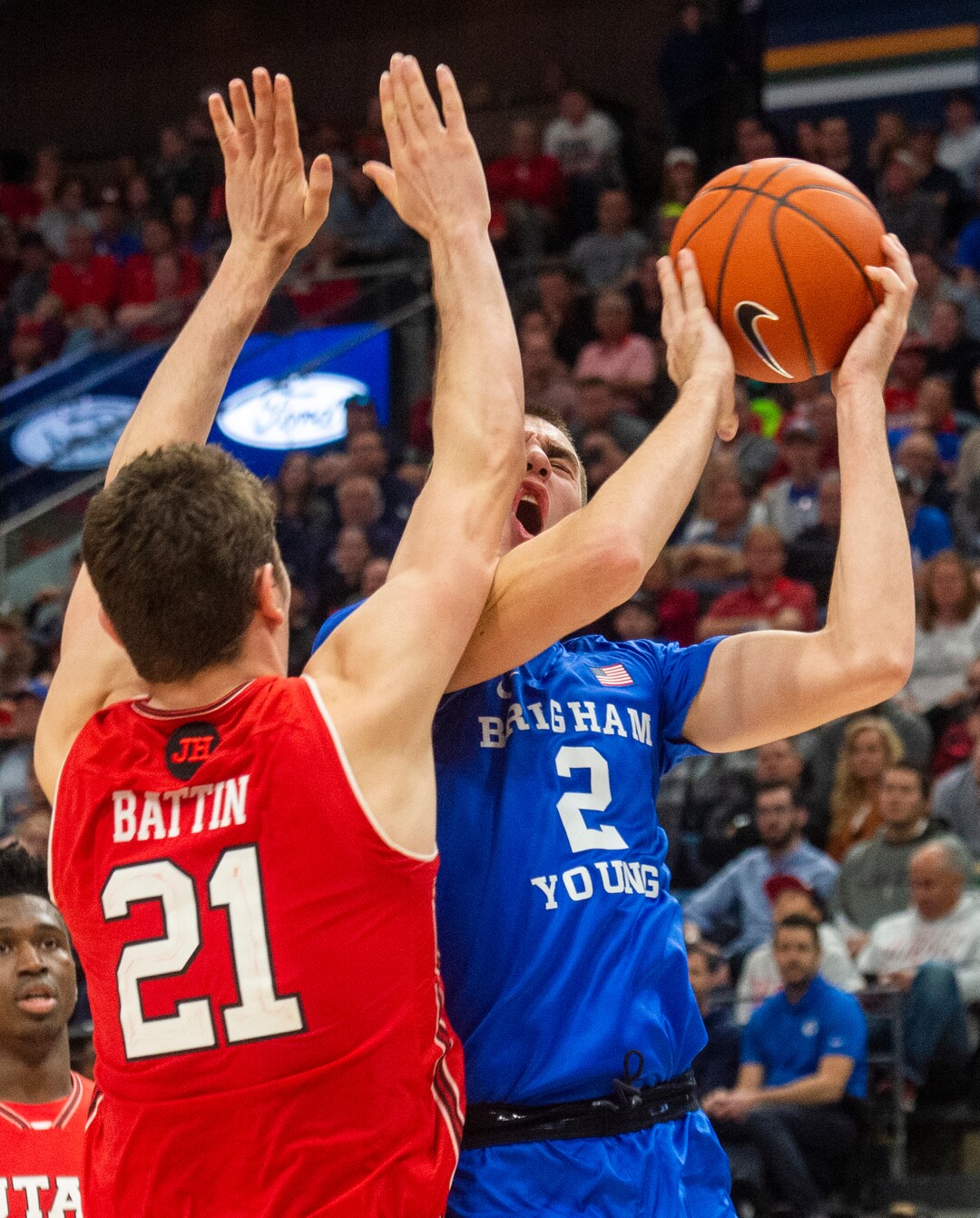 (Rick Egan  |  The Salt Lake Tribune)   Brigham Young Cougars guars Zac Seljaas (2) is called for an offensive foul as he collides with Utah Utes forward Riley Battin (21), in basketball action in the Beehive Classic, between against the Brigham Young Cougars and Utah Utes, at the Vivint Smart Home Arena, Saturday December 8, 2018.