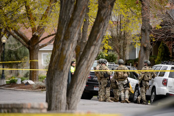 (Trent Nelson | The Salt Lake Tribune)  
Law enforcement at the scene after an incident where a man barricaded himself in a house on Princeton Avenue near 1100 East in Salt Lake City, Wednesday April 18, 2018.