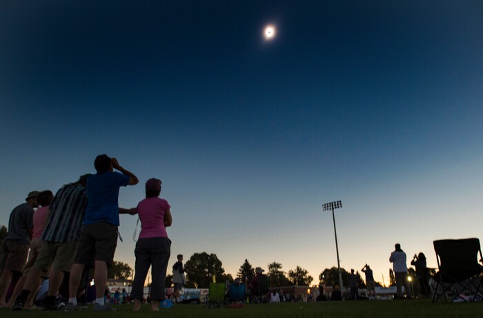  (Rick Egan  |  The Salt Lake Tribune)  Darkness surrounds the ball park during the totality phase of the solar eclipse, at Melaleuca Baseball Park, in Idaho Falls, Monday, August 21, 2017.


