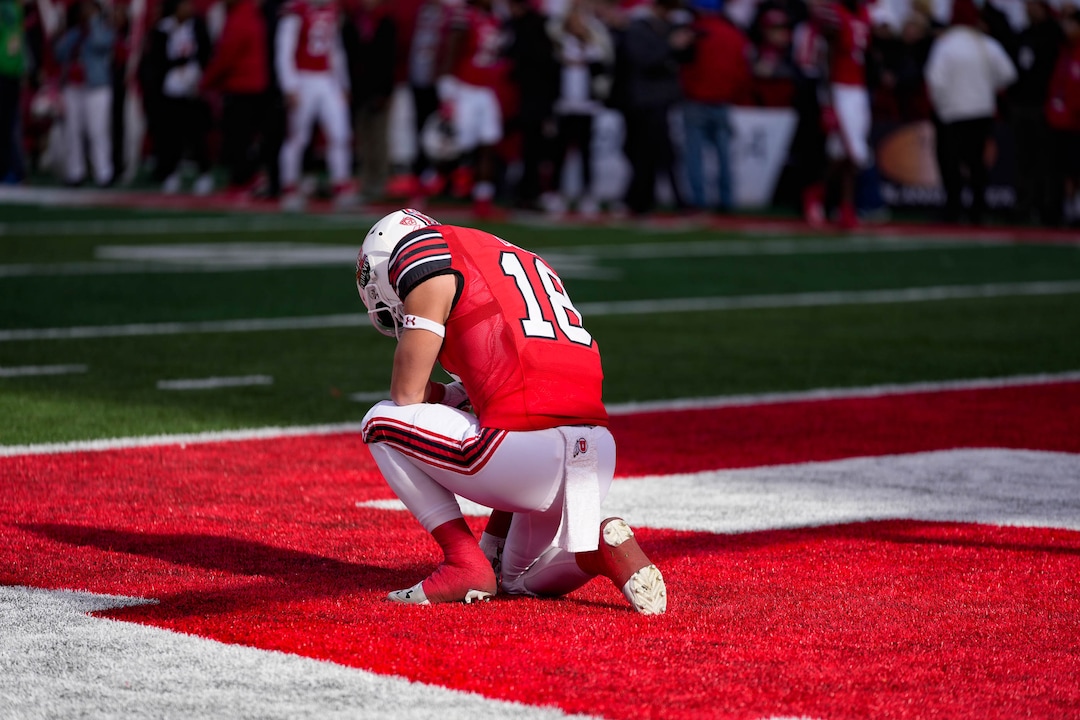 (Francisco Kjolseth | The Salt Lake Tribune) Utah Utes wide receiver Britain Covey (18) kneels in the end zone before the start of the game as the University of Utah hosts the Colorado Buffaloes in Pac-12 football, Friday, Nov. 26, 2021 at Rice-Eccles Stadium.