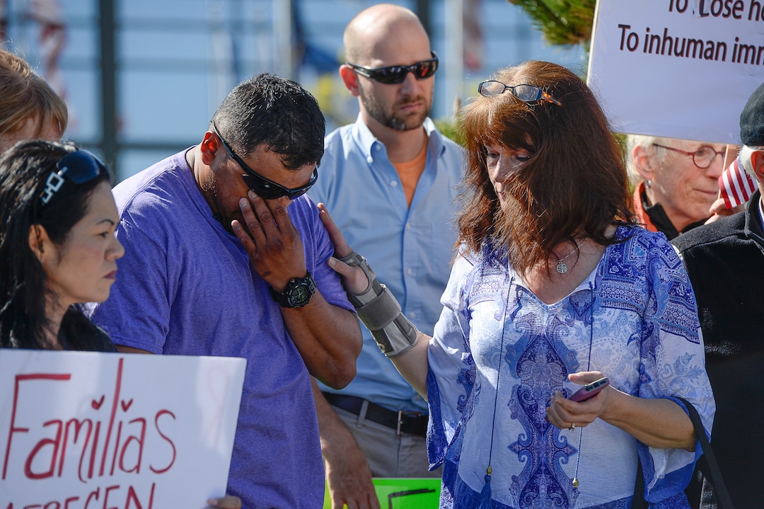 (Francisco Kjolseth | The Salt Lake Tribune)  Carlos Juarez, a legal permanent resident of the United States becomes emotional as he speaks in support of his wife Silvia who was detained by ICE agents last week in a Michaels parking lot in front of their 8-year-old daughter.  Mormon Women for Ethical Government and other concerned citizens gathered at the Department of Homeland Security field office in West Valley City on Wed. May 3, 2017, in a show of solidarity for a young mother.