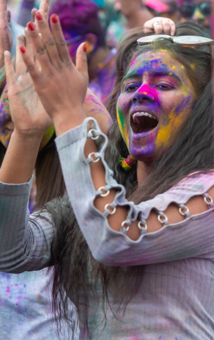 (Rick Egan  |  The Salt Lake Tribune)    
Hira Hamid sings along with the Bollypop Utah dancers, at the Holi Festival of Colors celebration at the Sri Sri Radha Krishna Temple in Spanish Fork, Saturday, March 30, 2019.