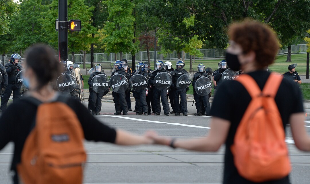(Francisco Kjolseth  |  The Salt Lake Tribune) Police line up to enforce a mandatory curfew in Salt Lake City on Monday, June 1, 2020, following violence and unrest over the weekend due to the death of George Floyd by police.