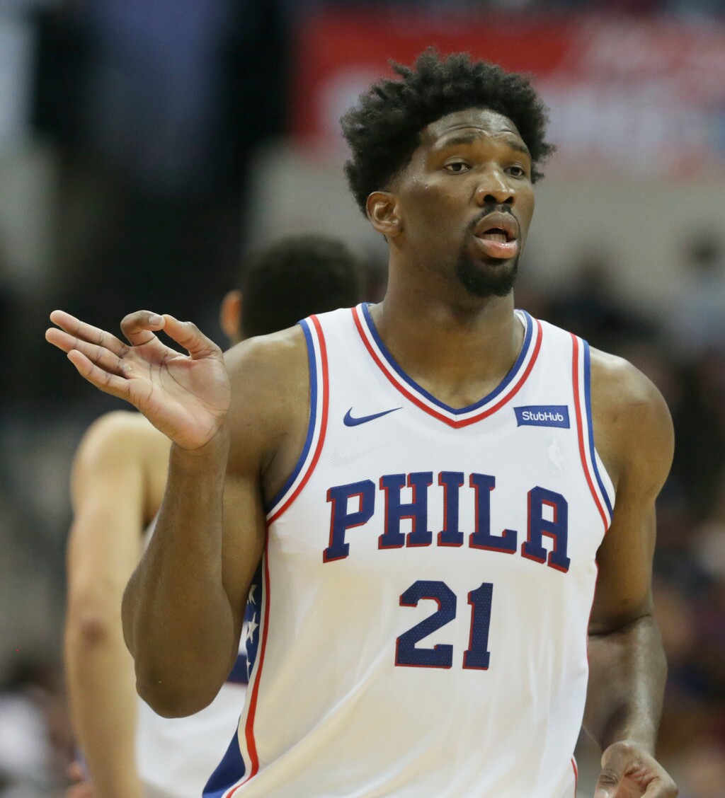 Philadelphia 76ers center Joel Embiid (21) reacts to hitting a three pointer during fourth quarter of an NBA basketball game against the Dallas Mavericks in Dallas, Saturday, Oct. 28, 2017. The 76ers won 112-110. (AP Photo/LM Otero)