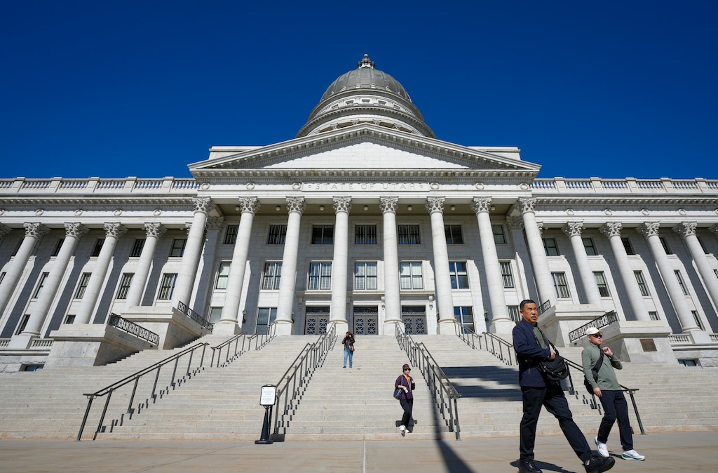 (Bethany Baker | The Salt Lake Tribune) People walk down the stairs of the Utah Capitol in Salt Lake City on Wednesday, Sept. 30, 2026.