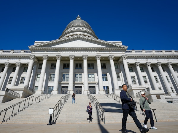 (Bethany Baker | The Salt Lake Tribune) People walk down the stairs of the Utah Capitol in Salt Lake City on Wednesday, Sept. 30, 2026.