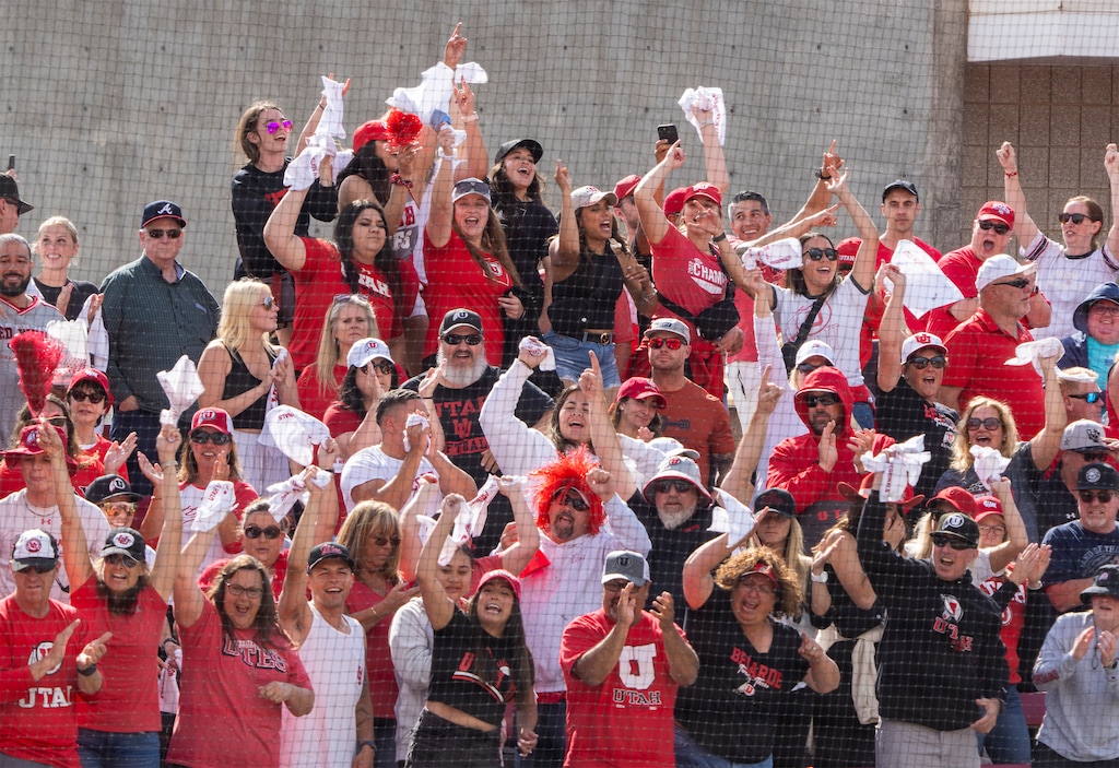 (Rick Egan | The Salt Lake Tribune)  Utah fans celebrate after Julia Jimenez hit a grand slam home run, giving Utah a 7-1 lead, in NCAA Softball Super Regionals action between the Utah Utes and the San Diego State Aztecs, on Saturday, May 27, 2023.