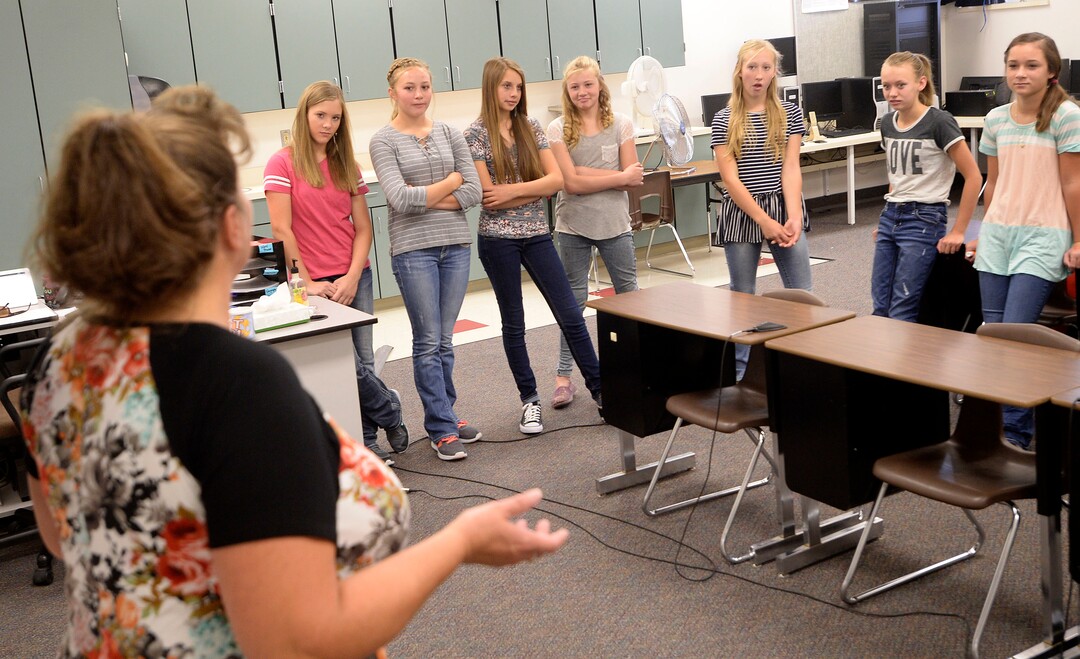 (Al Hartmann  |  The Salt Lake Tribune) Teachers aid Kelly Kunzler talks about possible careers and getting part time work in the real world to an all girls 7th and 8th grade class at Park Valley School Wednesday August 30.  She also teaches about agriculture and runs the computer lab.