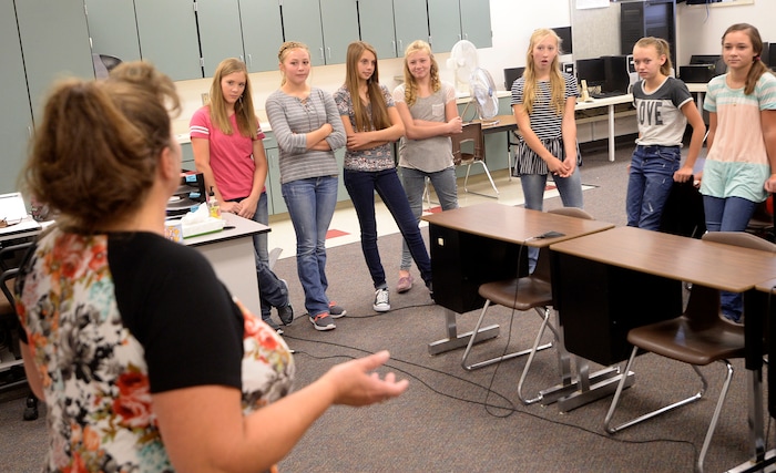 (Al Hartmann | The Salt Lake Tribune) Teachers aid Kelly Kunzler talks about possible careers and getting part time work in the real world to an all girls 7th and 8th grade class at Park Valley School Wednesday August 30. She also teaches about agriculture and runs the computer lab.
