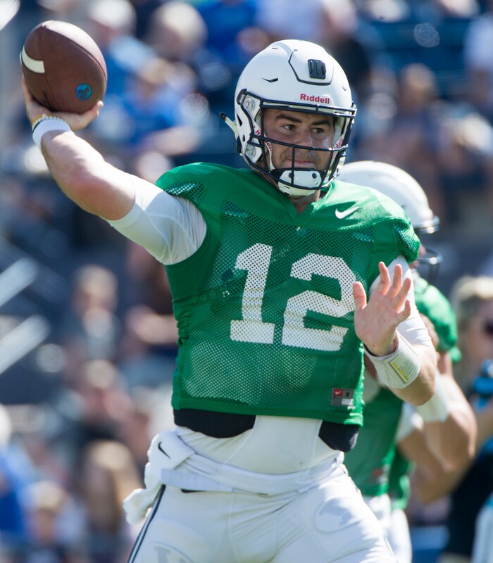 (Rick Egan  |  The Salt Lake Tribune) BYU quarterback, Tanner Mangum (12) runs the offense, during the BYU Cougars public scrimmage at Lavell Edwards Stadium, Thursday, August 17, 2017.