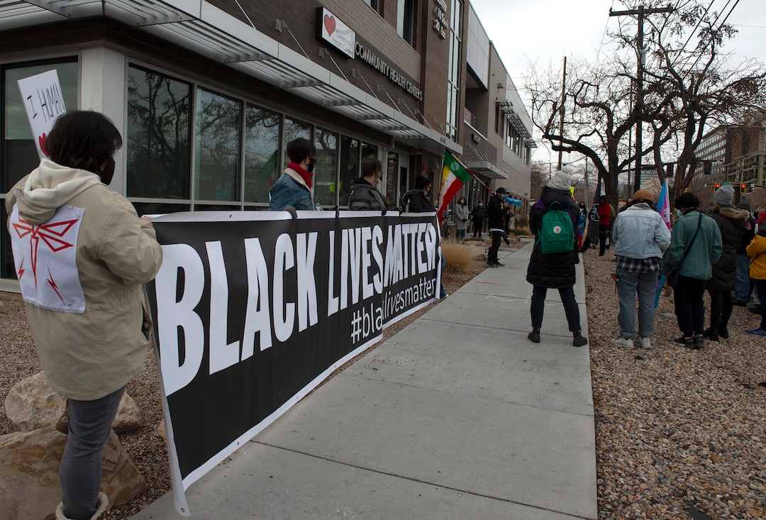 (Rick Egan | The Salt Lake Tribune)  Carl Moore founder of PANDOS and SLC Air Protectors, talks to the crowd, as he joins Black Lives Matter and other groups, to protest the way the health department has been forcing people experiencing homelessness to move in the middle of a pandemic and the coldest time of the year, in front of the Salt Lake Public Health Center on Friday, Dec. 18, 2020.