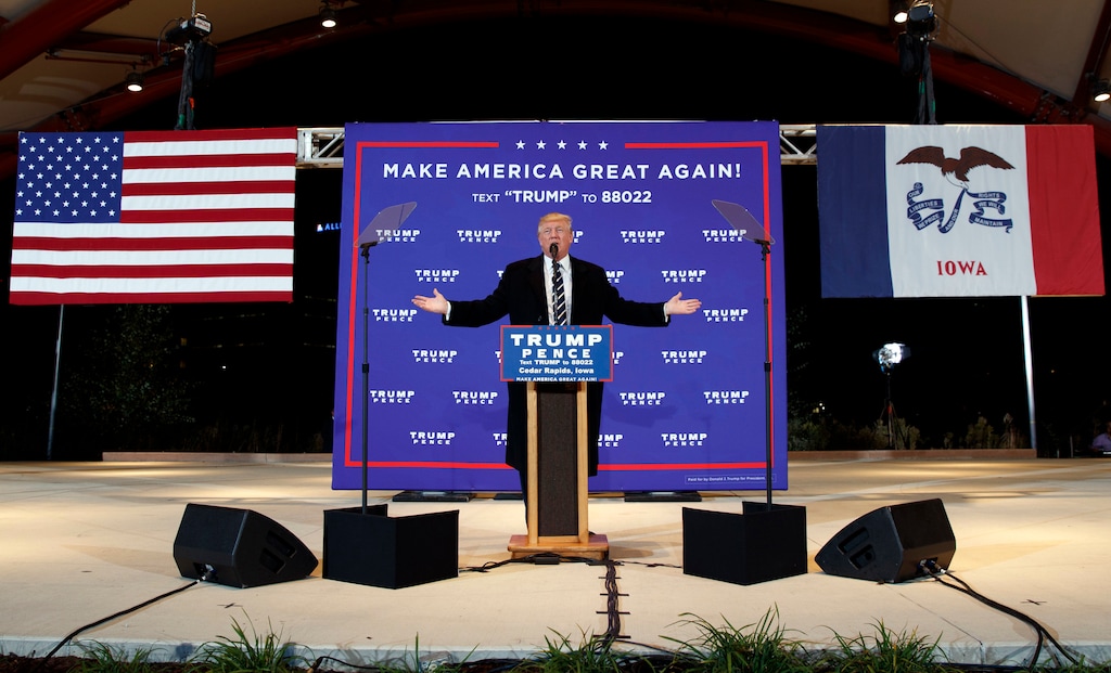 FILE - In this Oct. 28, 2016, file photo, then-Republican presidential candidate Donald Trump speaks during a campaign rally in Cedar Rapids, Iowa. Barack Obama’s earliest supporters in Iowa are setting aside the wistful romance of his surprise 2008 caucus victory and focusing on who can seize the presidency from Donald Trump. (AP Photo/ Evan Vucci, File)