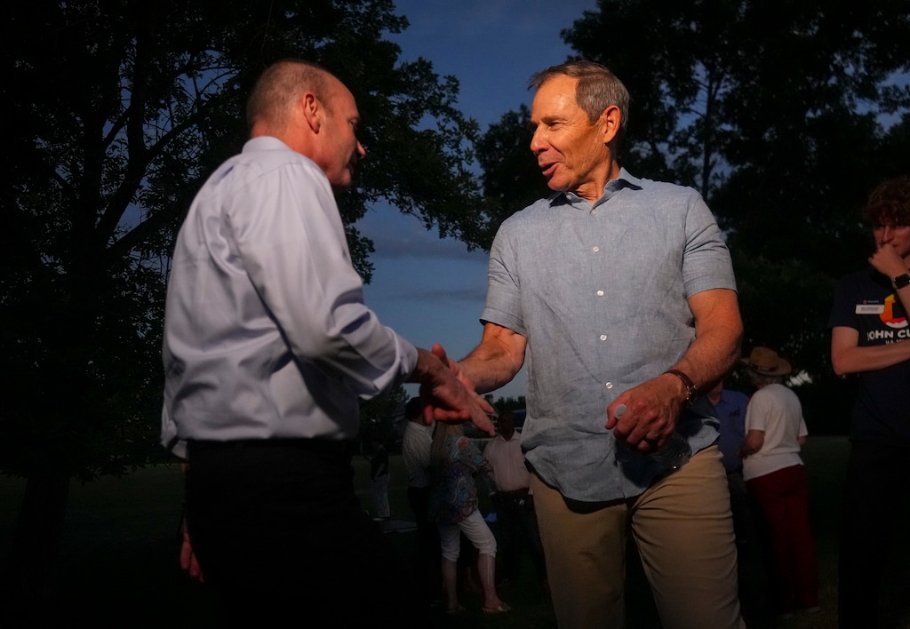 (Bethany Baker | The Salt Lake Tribune) U.S. Sen. Mike Lee, left, chats with U.S. Sen. candidate Rep. John Curtis during a watch party in Provo on Tuesday, June 25, 2024.