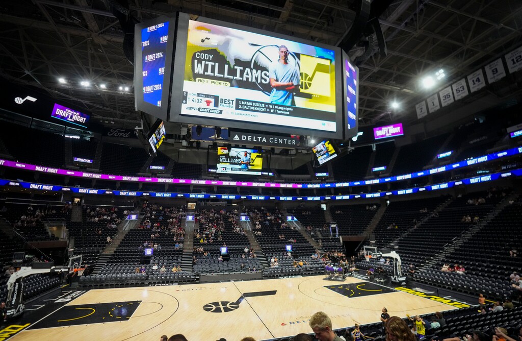 (Bethany Baker  |  The Salt Lake Tribune) Cody Williams flashes across the screen as the draft pick for the Utah Jazz during the NBA draft party at the Delta Center in Salt Lake City on Wednesday, June 26, 2024.