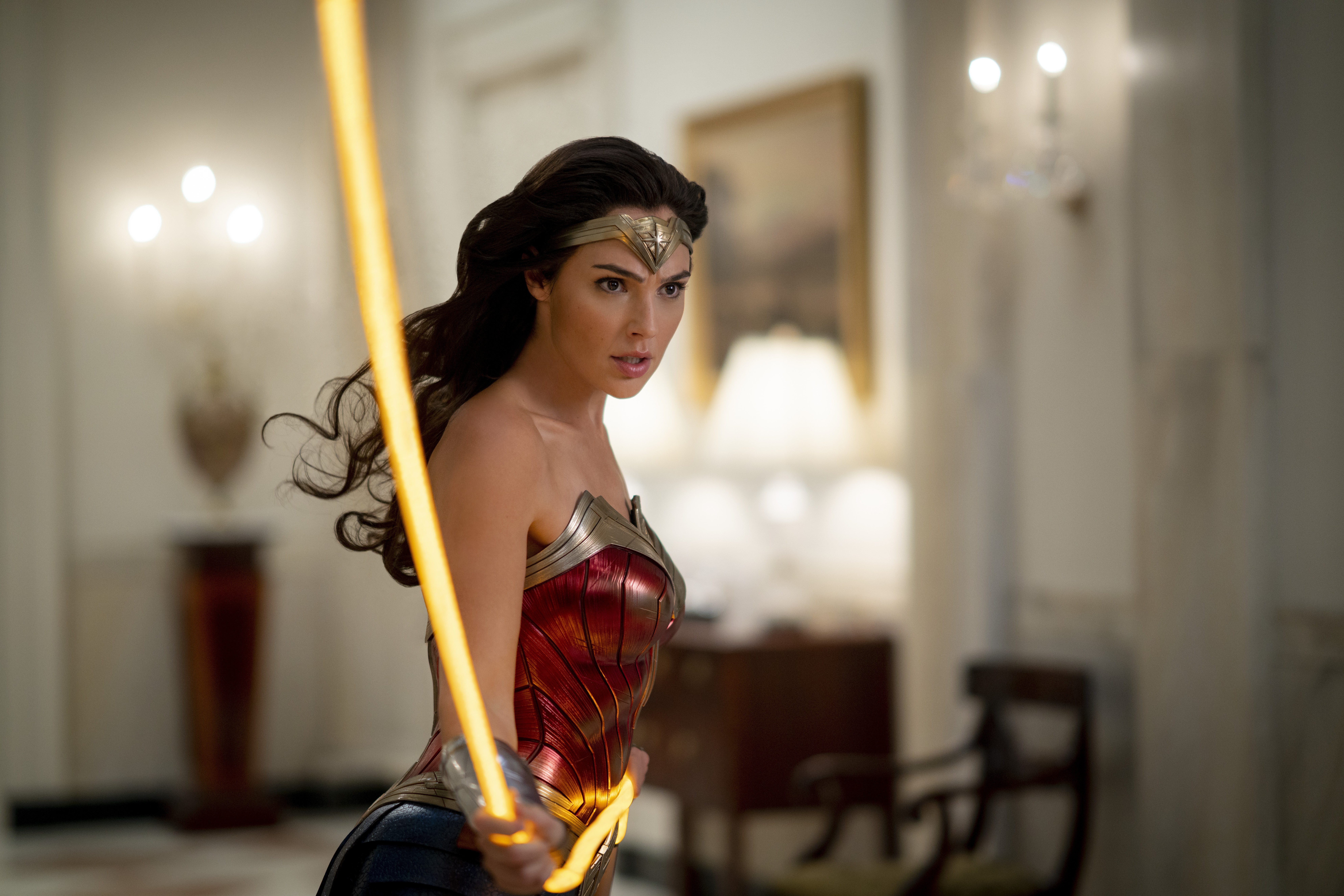 (Clay Enos | Warner Bros.) Gal Gadot returns as the Amazon superheroine in "Wonder Woman 1984," an action sequel that debuts in theaters where open and streaming on HBO Max on Friday, Dec. 25, 2020.