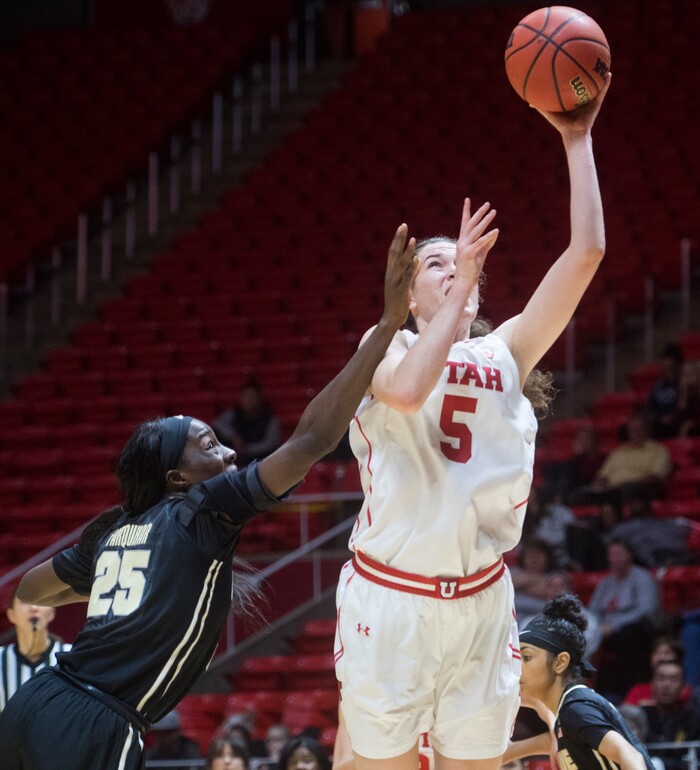 (Rick Egan  |  The Salt Lake Tribune)  Utah Utes center Megan Huff (5) takes a shot, as Purdue Boilermakers guard Tamara Farquhar (25) defends, in basketball action Utah Utes vs. Purdue Boilermakers, at the Jon M. Huntsman Center, Monday, November 20, 2017.