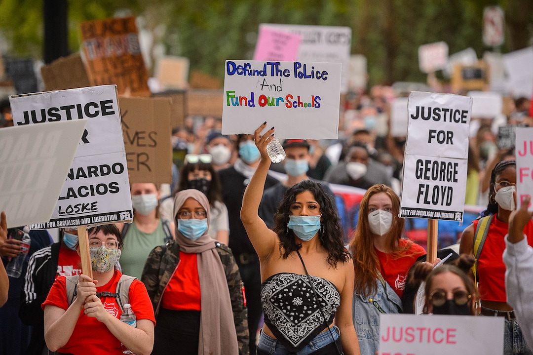 (Trent Nelson  |  The Salt Lake Tribune) People march against police brutality in Salt Lake City on Saturday, June 13, 2020.
