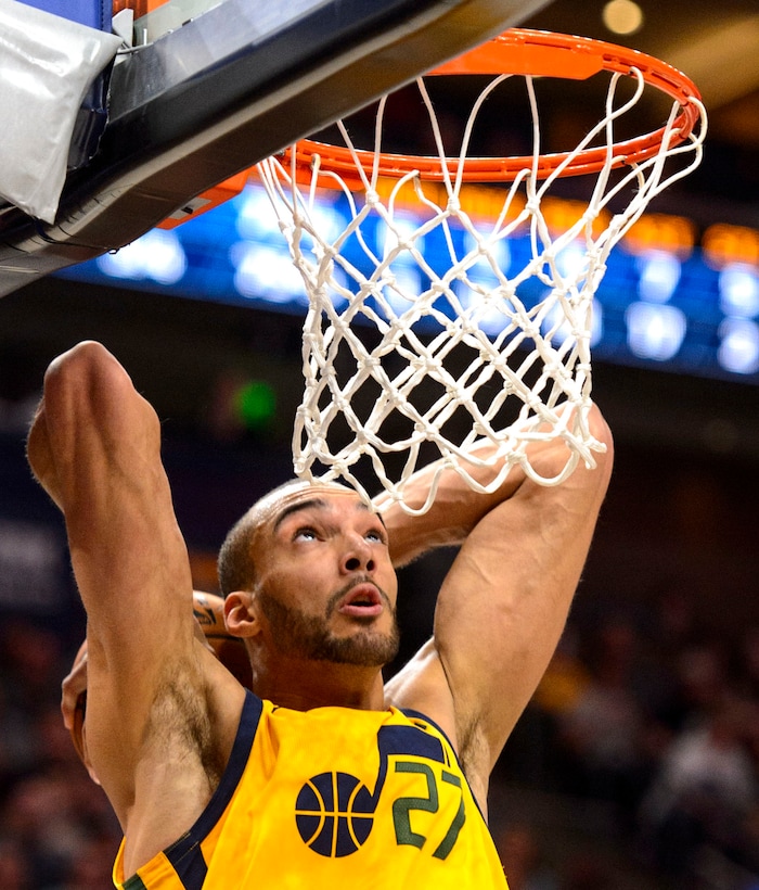 (Steve Griffin  |  The Salt Lake Tribune)  Utah Jazz center Rudy Gobert (27) throws down a dunk during the Utah Jazz versus Detroit Pistons at Vivint Smart Home Arena in Salt Lake City Tuesday March 13, 2018.