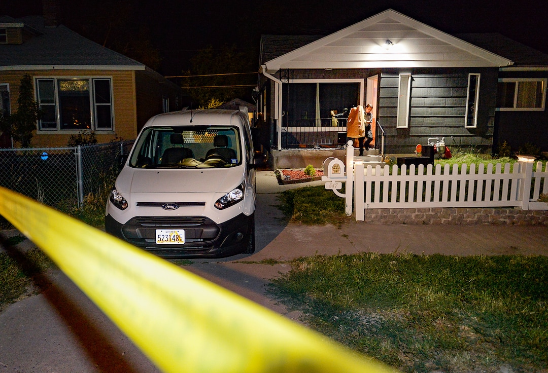 (Francisco Kjolseth  |  The Salt Lake Tribune)  Police investigators remove multiple bags of evidence during their search of a home at 547 N. 1000 West in Salt Lake City as part of the disappearance of University of Utah student MacKenzie Lueck that carried on into the early morning hours of Thursday, June 27, 2019.