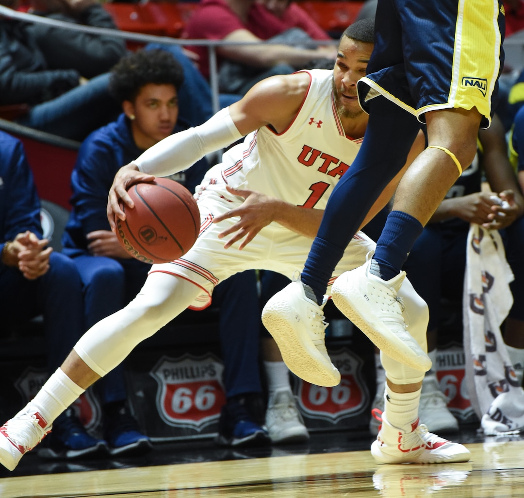 (Francisco Kjolseth  |  The Salt Lake Tribune)  Utah Utes guard Charles Jones Jr (1) moves past Northern Arizona in Men's Basketball at the Jon M Huntsman Center in Salt Lake City, Utah, on Friday, Dec. 21, 2018.