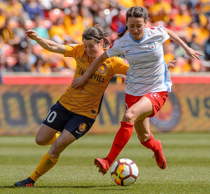 (Trent Nelson | The Salt Lake Tribune)  
Utah Royals FC hosts the Chicago Red Stars, at Rio Tinto Stadium in Sandy, Saturday April 14, 2018. Utah Royals FC midfielder Diana Matheson (10) and Chicago Red Stars midfielder Taylor Comeau (7).