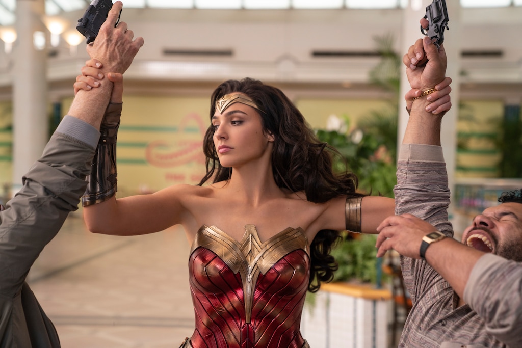 (Clay Enos  |  courtesy of Warner Bros.) Wonder Woman, played by Gal Gadot, disarms a pair of thieves in an '80s shopping mall, in a scene from "Wonder Woman 1984." Five theaters along the Wasatch Front ranked in the top 10 nationally for ticket sales of the DC Comics-based superheroine action movie over Christmas weekend.