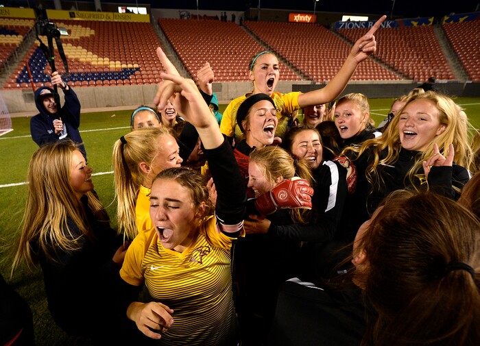 (Scott Sommerdorf   |  The Salt Lake Tribune)   Maple Mountain celebrates after they won the shootout period after double overtime to win the 5A championship game over Timpanogos, Friday, October 20, 2017. 