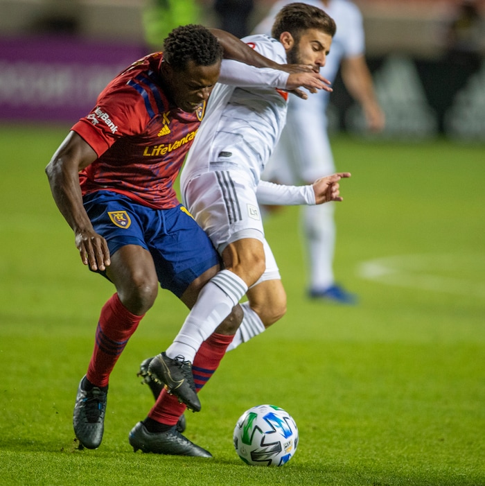 (Rick Egan  |  The Salt Lake Tribune). Real Salt Lake defender Nedum Onuoha (14) goes for the ball along with Los Angeles FC forward Diego Rossi (9), in MLS soccer action between Real Salt Lake and Los Angeles FC at Rio Tinto Stadium, on Wednesday, Sept. 9, 2020.


