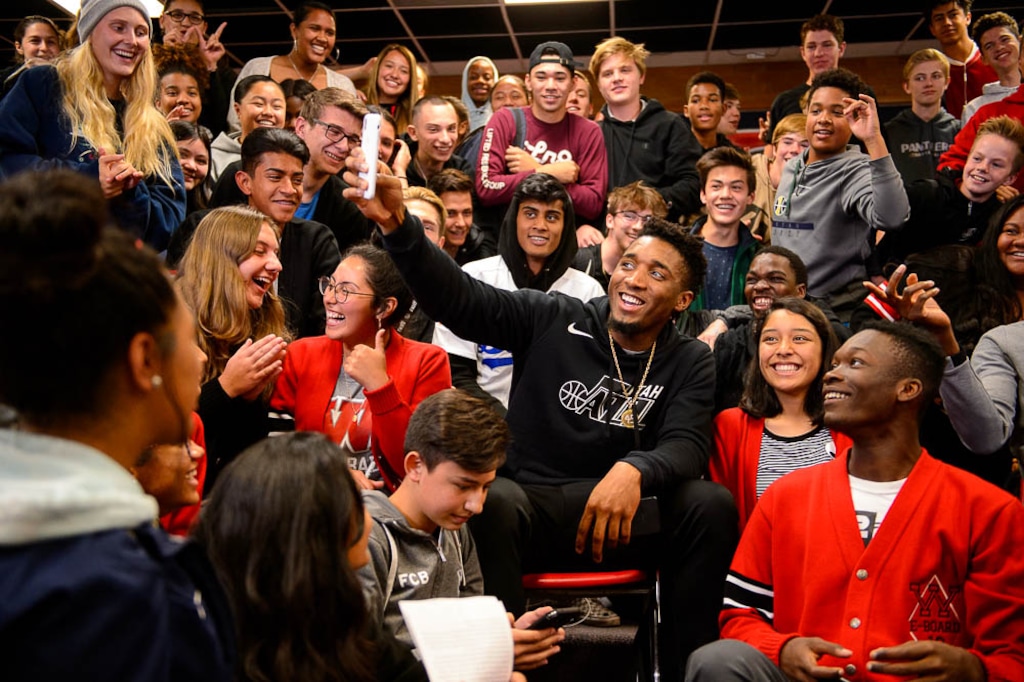 (Trent Nelson | The Salt Lake Tribune)  Donovan Mitchell takes a selfie with West High School students after speaking to them in Salt Lake City, Tuesday Oct. 9, 2018.