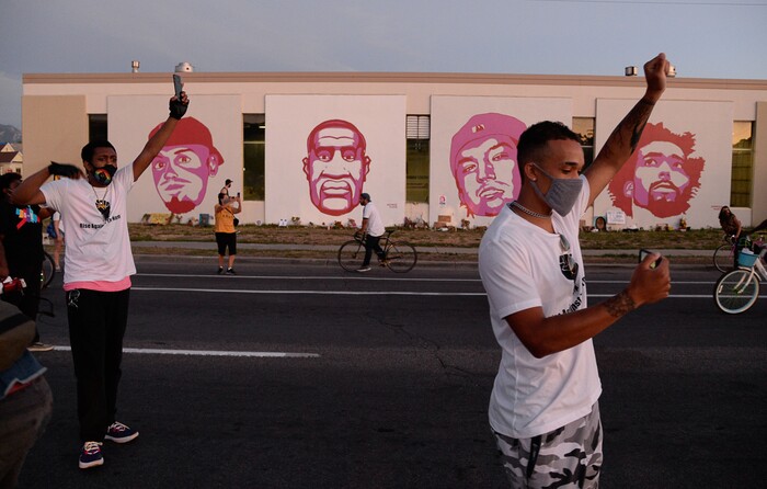 (Francisco Kjolseth  |  The Salt Lake Tribune) Protesters march the streets of downtown Salt Lake City as they congregate at 800 South, 300 West by the mural of George Floyd and other people killed in Utah by police as they rally against police brutality on Friday, June 26, 2020.