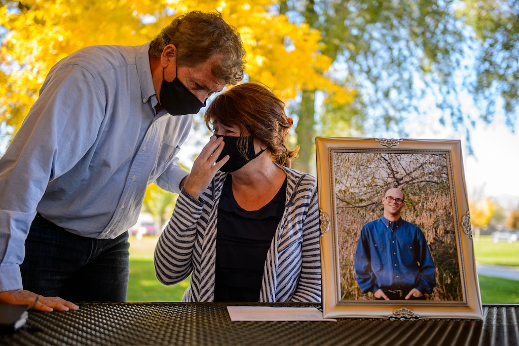(Trent Nelson | The Salt Lake Tribune)
Rob Whittle comforts Annie Esposito before a news conference in Riverton on Wednesday, Oct. 21, 2020. The two detailed the loss of their son Jason who was killed by police last year in 2018 and announced the filing of a lawsuit saying the Unified police officer should have used less than deadly force.