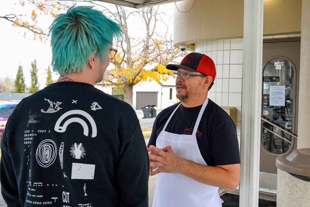 (Chris Samuels | The Salt Lake Tribune) Longtime customer Ian Motiee of Millcreek chats with Hector Uribe outside Hector’s Mexican Food in Millcreek, Friday, Nov. 4, 2022.