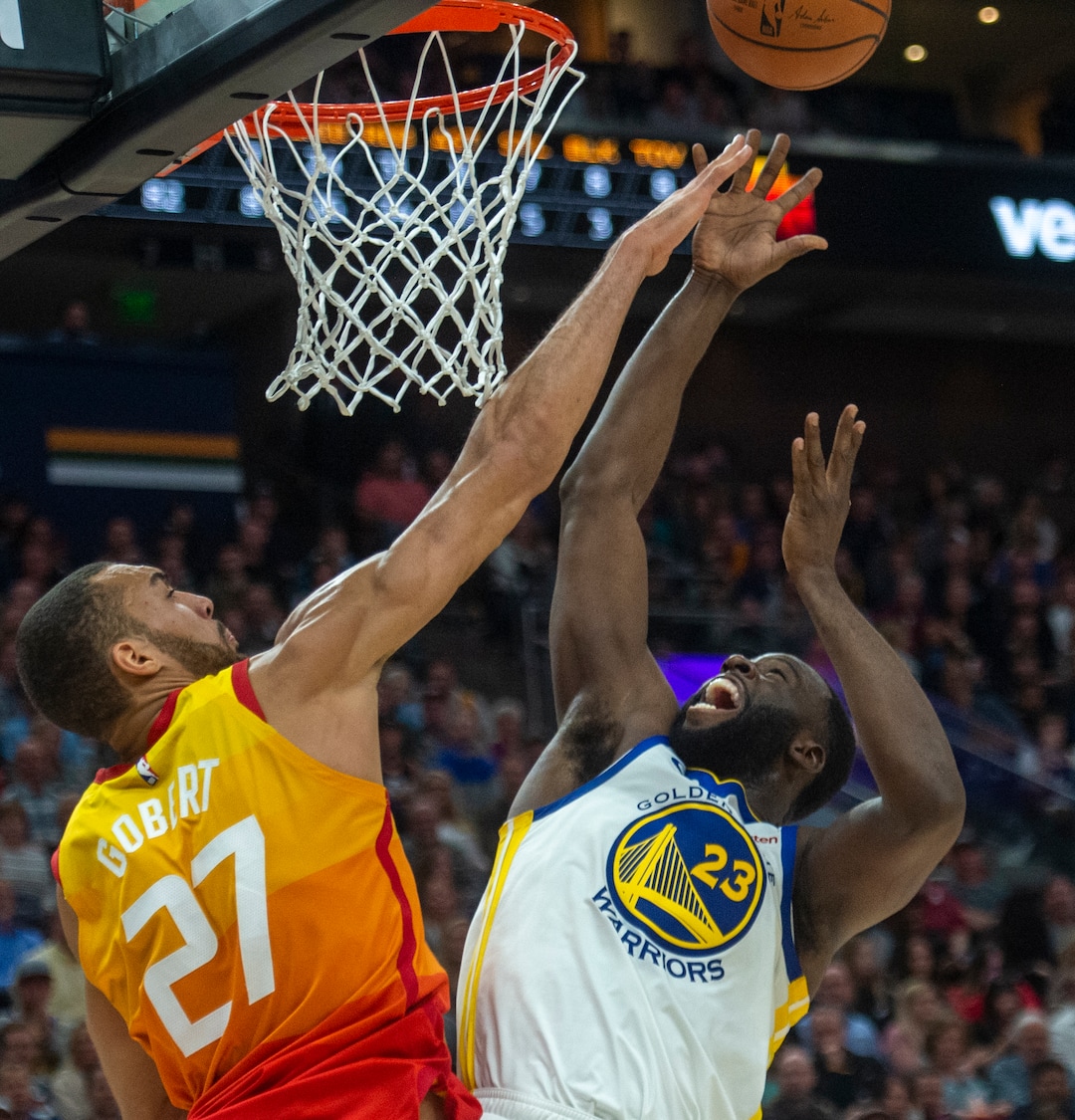 (Rick Egan  |  The Salt Lake Tribune)  Utah Utah Jazz center Rudy Gobert (27) blocks a shot by Golden State Warriors forward Draymond Green (23), in NBA action between Utah Jazz and Golden State Warriors, in Salt Lake City, Wednesday, Dec. 19, 2018.
