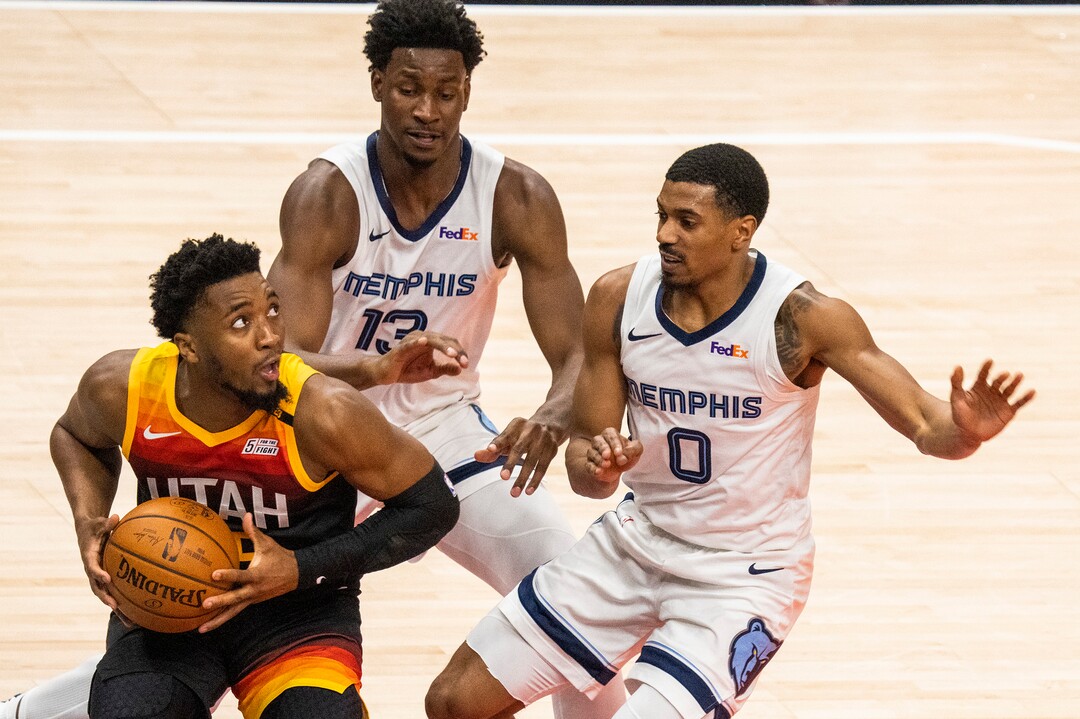 (Rick Egan | The Salt Lake Tribune) Utah Jazz guard Donovan Mitchell (45) looks for a shot, as Memphis Grizzlies forward Jaren Jackson Jr. (13) and Memphis Grizzlies guard De'Anthony Melton (0)  defend, in NBA Playoff game 2, between the Utah Jazz and the Memphis Grizzlies at Vivint Arena, on Wednesday, May 26, 2021.