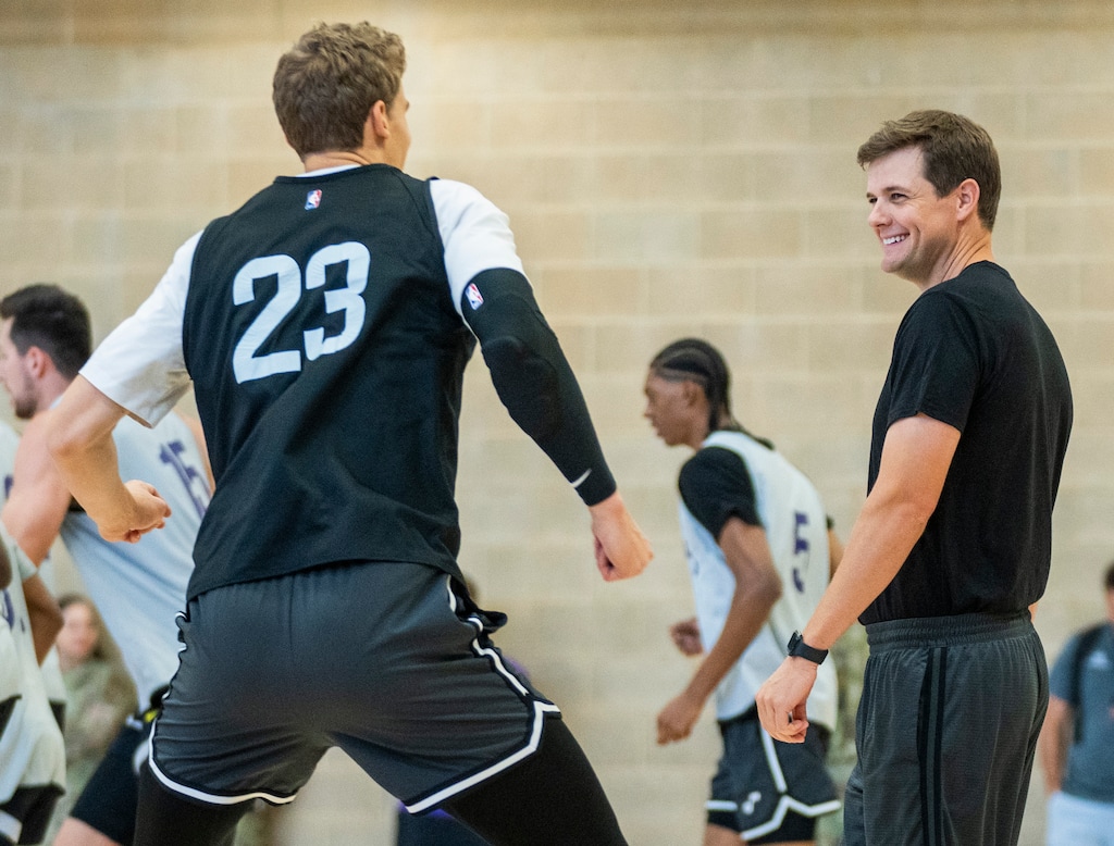 (Rick Egan | The Salt Lake Tribune)  Utah Jazz head coach Will Hardy shares a laugh with Utah Jazz forward Lauri Markkanen (23) during warmups before a Jazz scrimmage at Hill Airfare Base, on Saturday, Oct. 5, 2024.