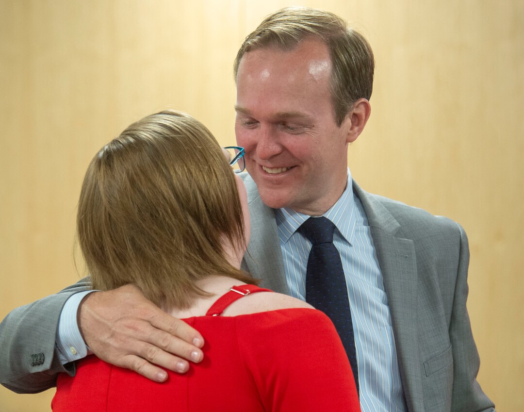 (Rick Egan  |  The Salt Lake Tribune)   Congressman Ben McAdams gives Julia Ludlow a hug, after she spoke about her suicide attempt at a news conference about suicide prevention, Monday, July 8, 2019.