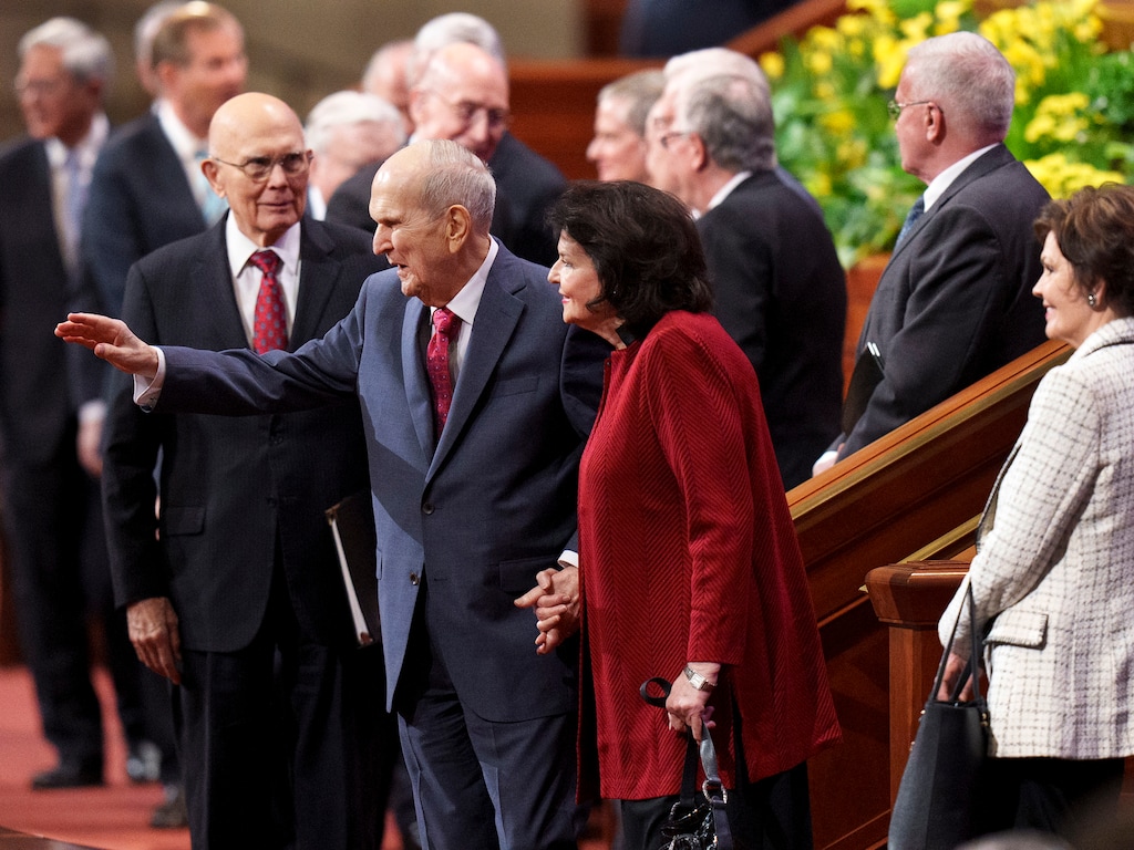 (Leah Hogsten | The Salt Lake Tribune) Russell M. Nelson leaves the morning session of General Conference with his wife, Wendy, in April. He missed attending the October conference in person after injuring his back in a fall.