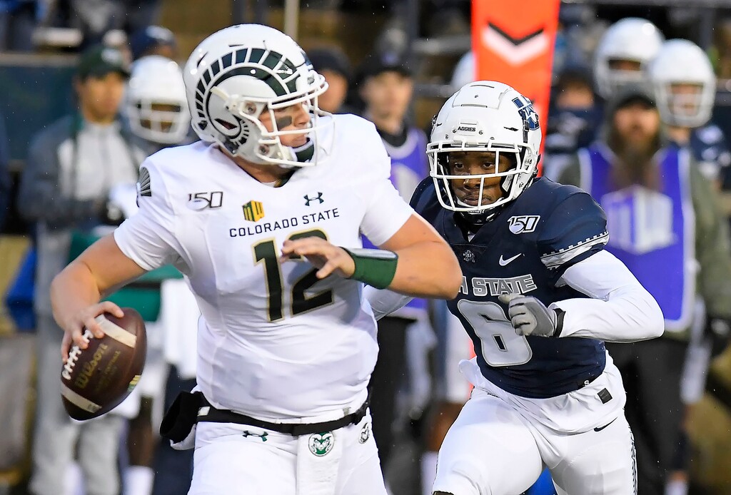 Utah State cornerback Cameron Haney (6) rushes in to sack Colorado State quarterback Patrick O'Brien (12) during an NCAA college football game, Saturday, Sept. 28, 2019, in Logan, Utah. (Eli Lucero/Herald Journal via AP)