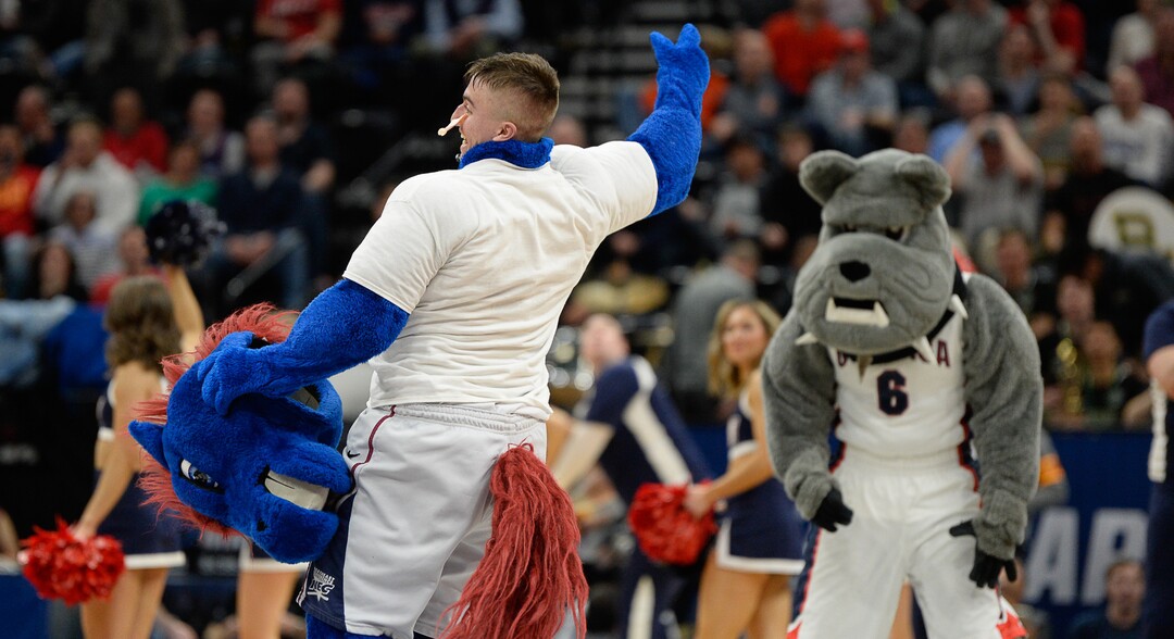 (Francisco Kjolseth  |  The Salt Lake Tribune)  The Fairleigh Dickinson mascot loses his head doing the splits as Gonzaga faces Fairleigh Dickinson in their first round menÕs NCAA March Madness tournament game at Vivint Smart Home Arena in Salt Lake City on Thursday, March 21, 2019.