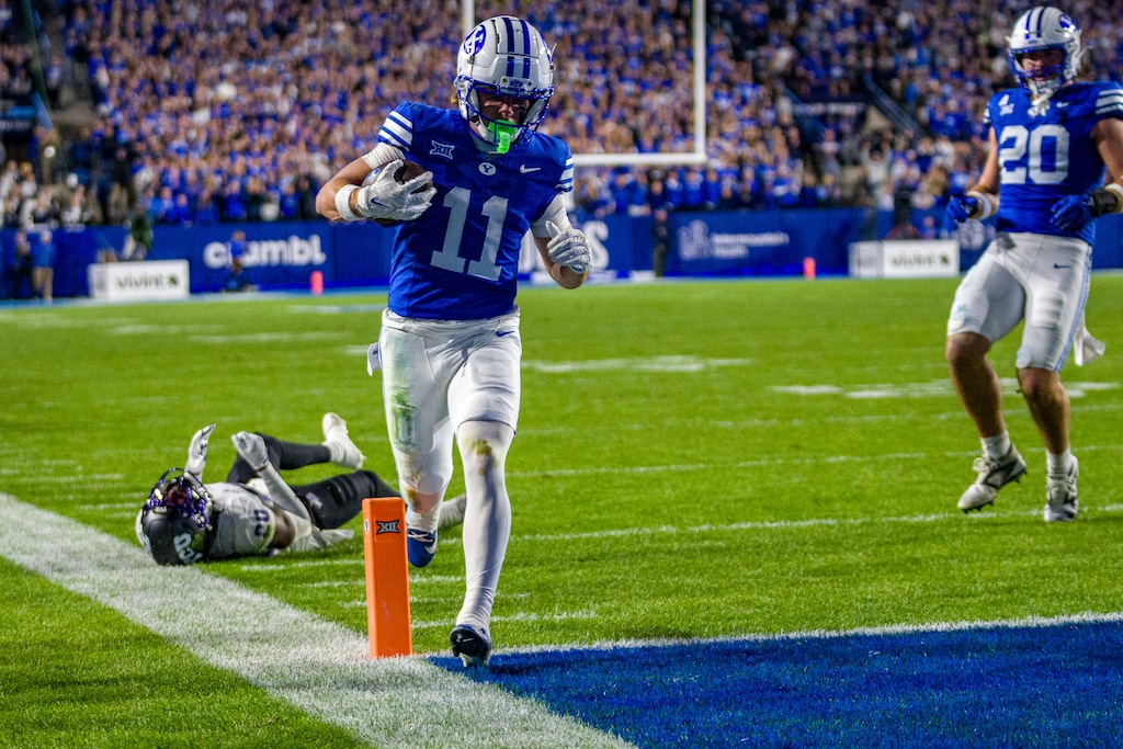 (Trent Nelson  |  The Salt Lake Tribune) BYU Cougars wide receiver Parker Kingston (11) runs for a touchdown as BYU hosts TCU, NCAA football in Provo on Saturday, Nov. 15, 2025.