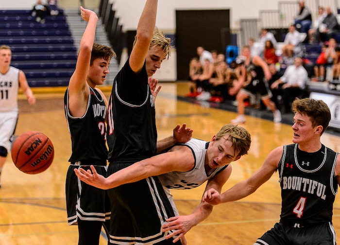 (Trent Nelson | The Salt Lake Tribune)  Corner Canyon's Blake Emery (23) passes the ball as Corner Canyon faces Bountiful in the title game of the Corner Canyon Tournament of Champions, high school boys' basketball in Draper, Saturday December 2, 2017.