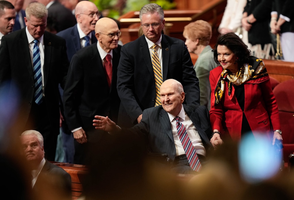 (Francisco Kjolseth  | The Salt Lake Tribune) President Russell M. Nelson, 100, leaves the afternoon session of General Conference with wife Wendy on Saturday, Oct. 5, 2024. Nelson is the oldest prophet-president in The Church of Jesus Christ of Latter-day Saints' 194-year history.