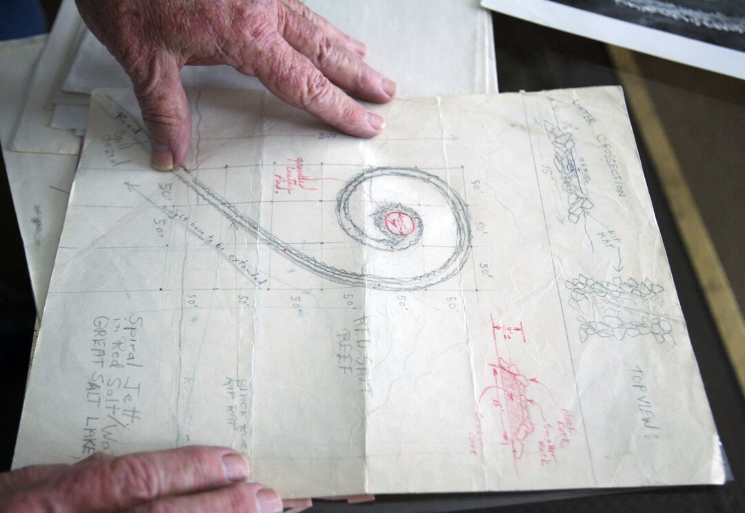 Steve Griffin  |  The Salt Lake Tribune) Bob Phillips looks over the original drawings for the Spiral Jetty  in his Ogden, Utah Thursday, Feb. 24, 2011.  Phillips was the contractor who built the Spiral Jetty for artist Robert Smithson.